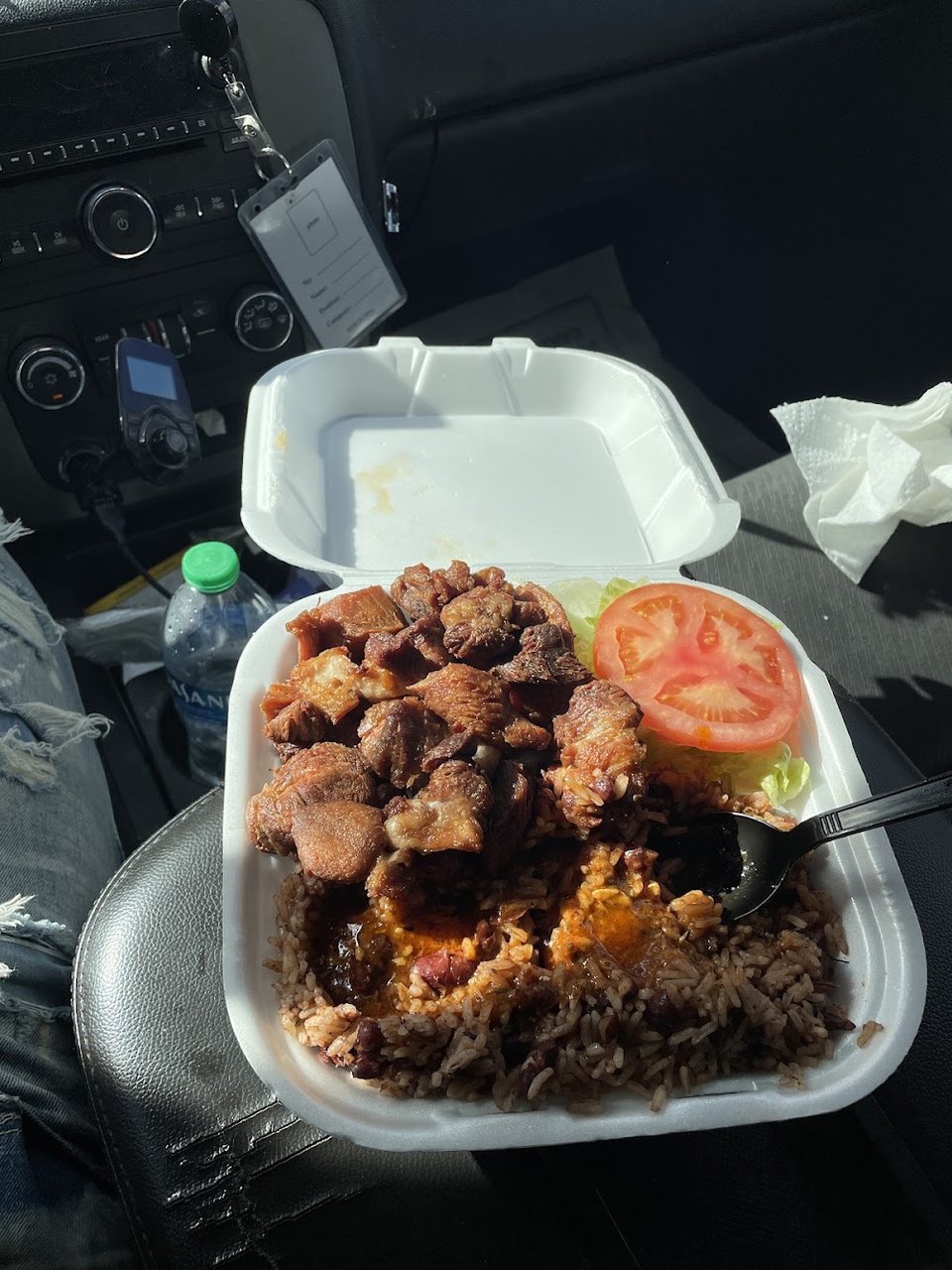 A close-up of Caribbean-style restaurant meals